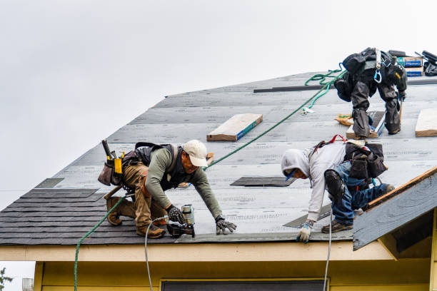 Professional Gutter Installation technician working in Ardenvoir, WA